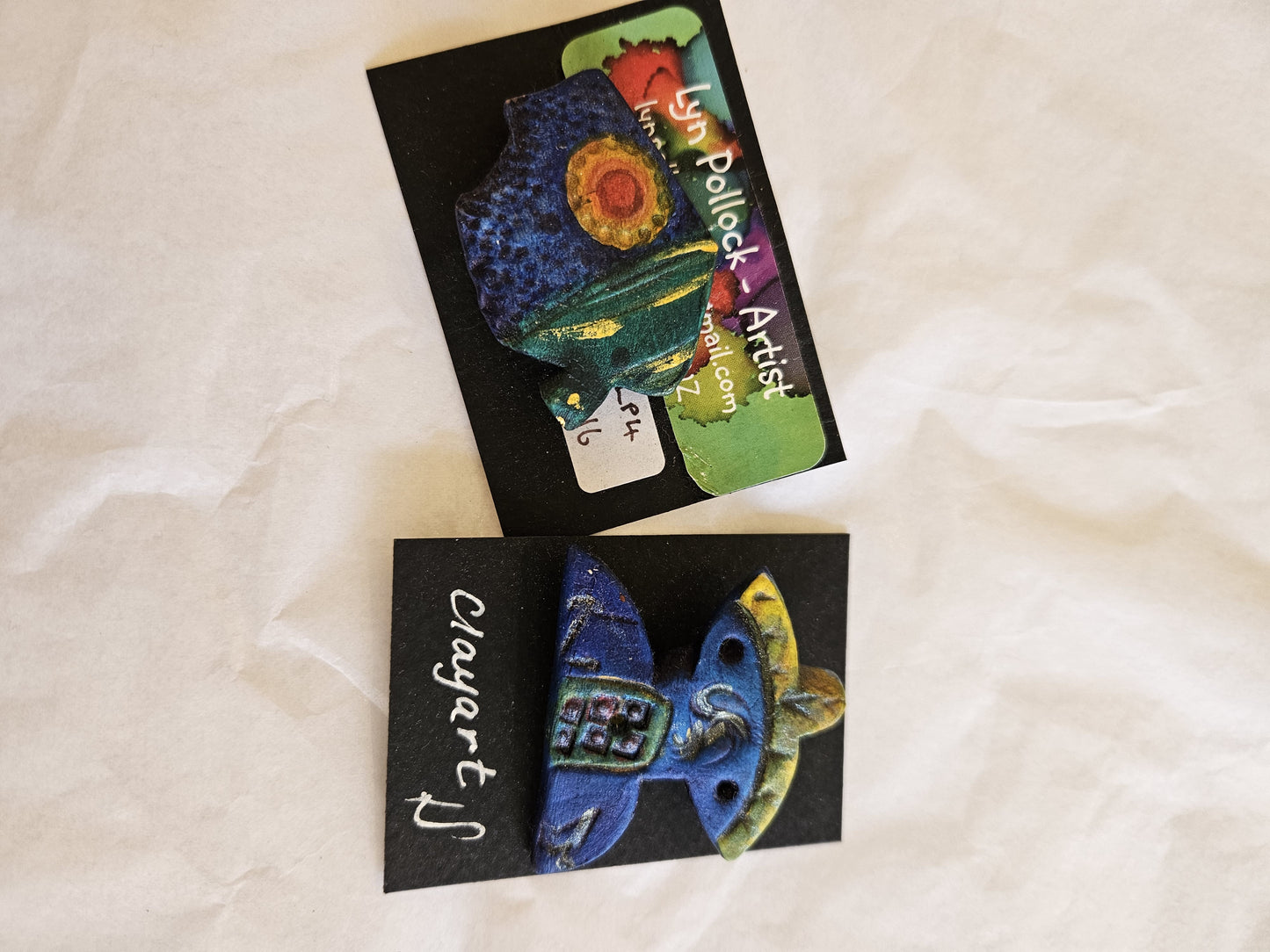 LP Clay house brooch