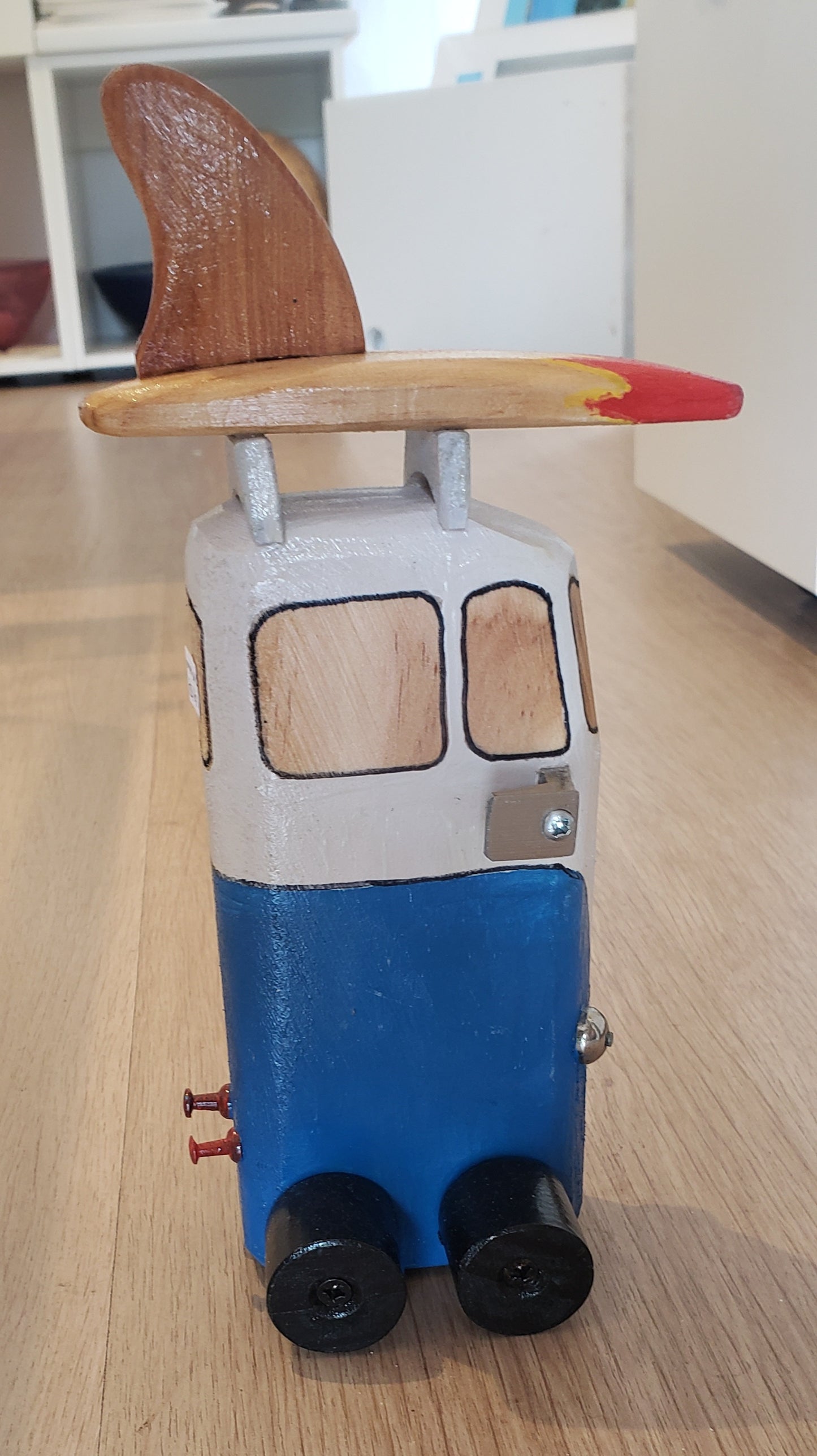 VW with Surfboard