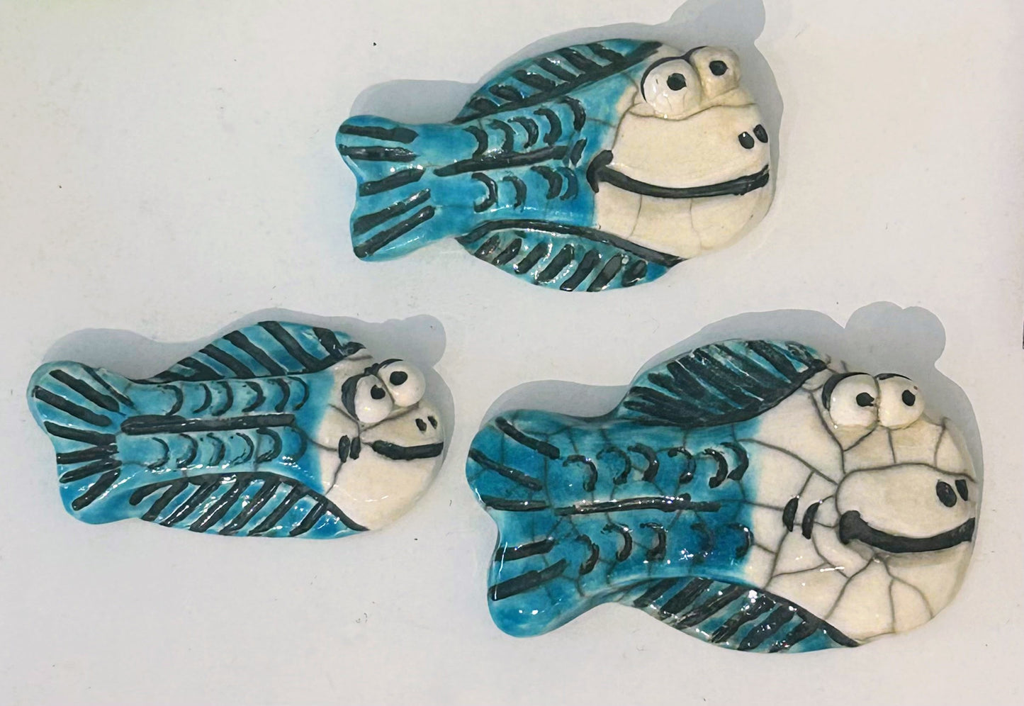 Three Ceramic Potty Fish