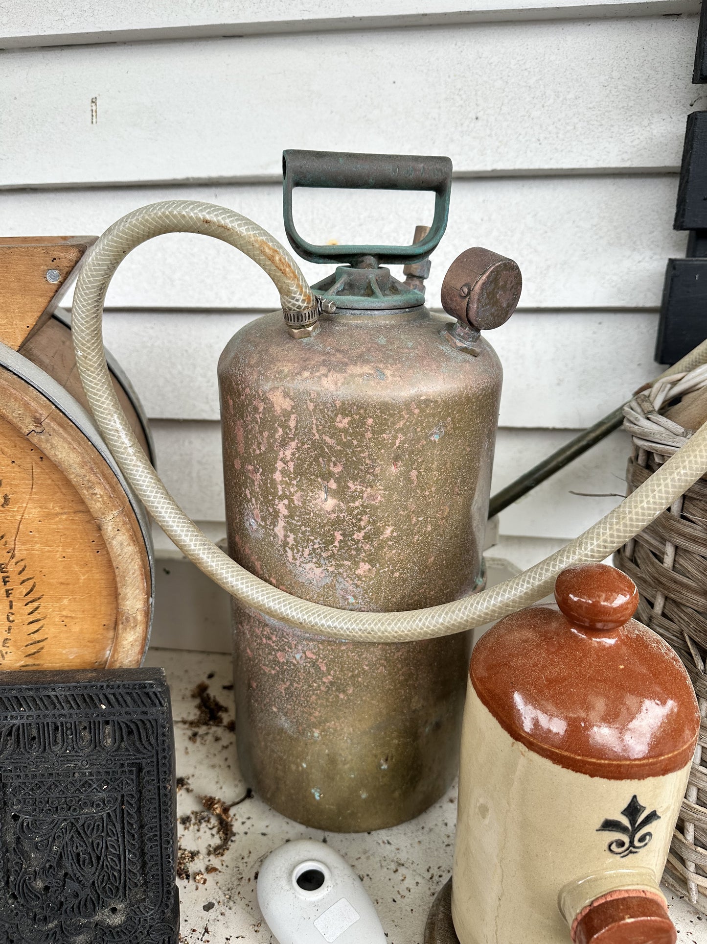 Vintage Antique Tank with Hose