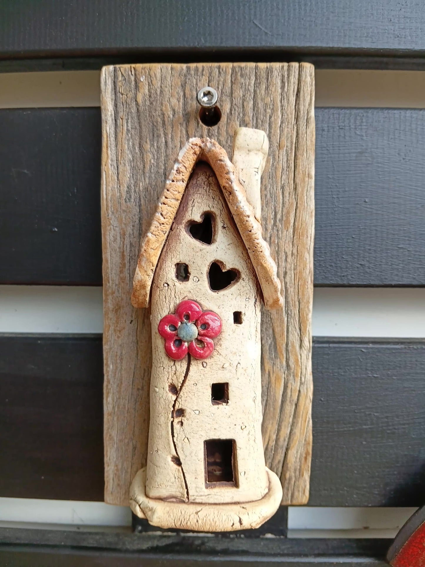 Clay House on Wood