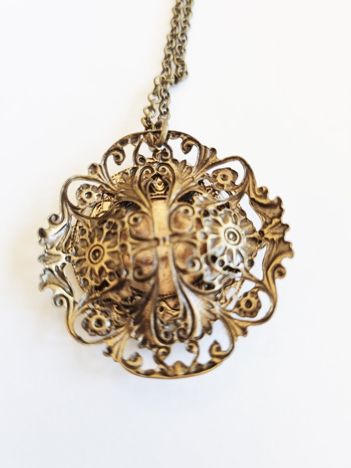 Ornate Layered filigree half penny pendant