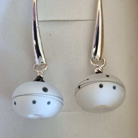 White Opaque black dots long Drop Earrings