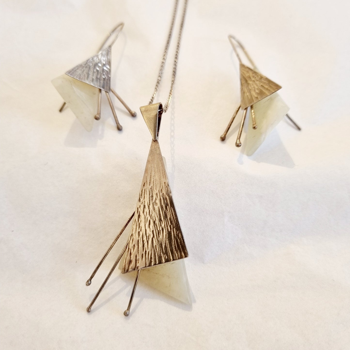 Diamond shaped earrings and pendant set with silver chain