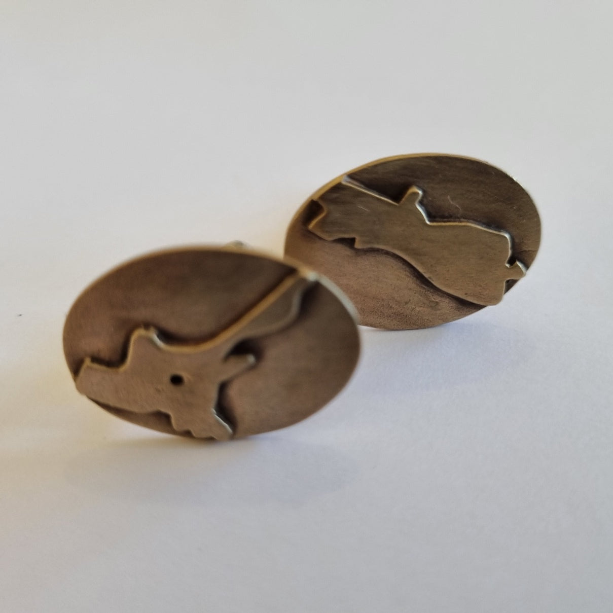 Cufflink - North & South Island