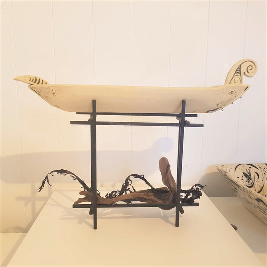 Waka on metal stand