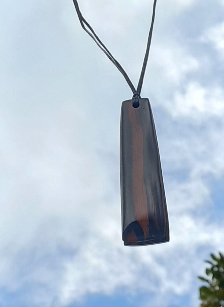 Ebony pendant toki