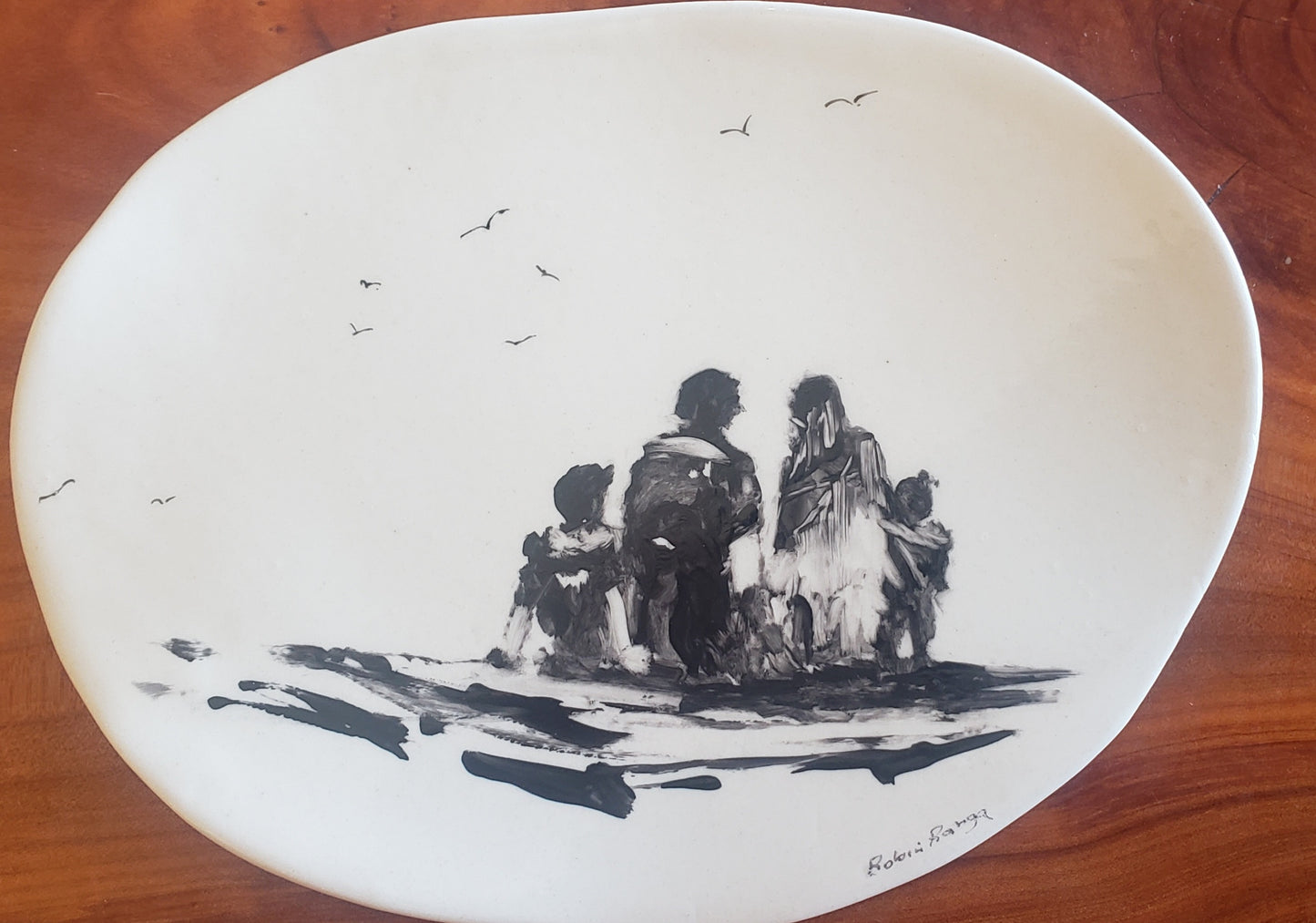 Mum and Dad sitting with 2 kids