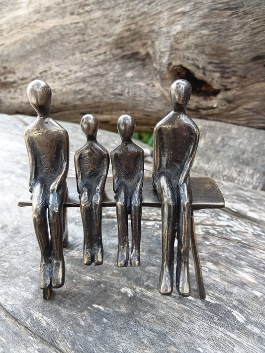 Family of 4 on a bench