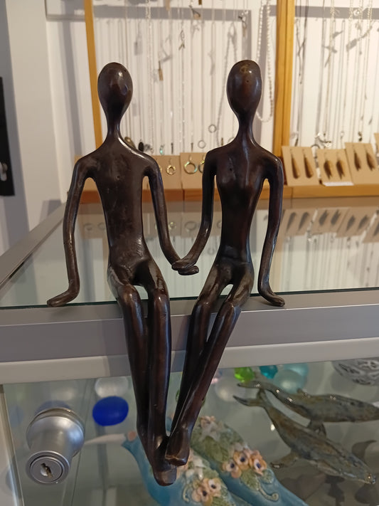 Brass sitting couple