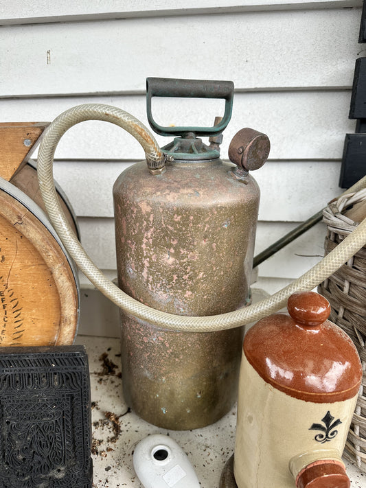 Vintage Antique Tank with Hose