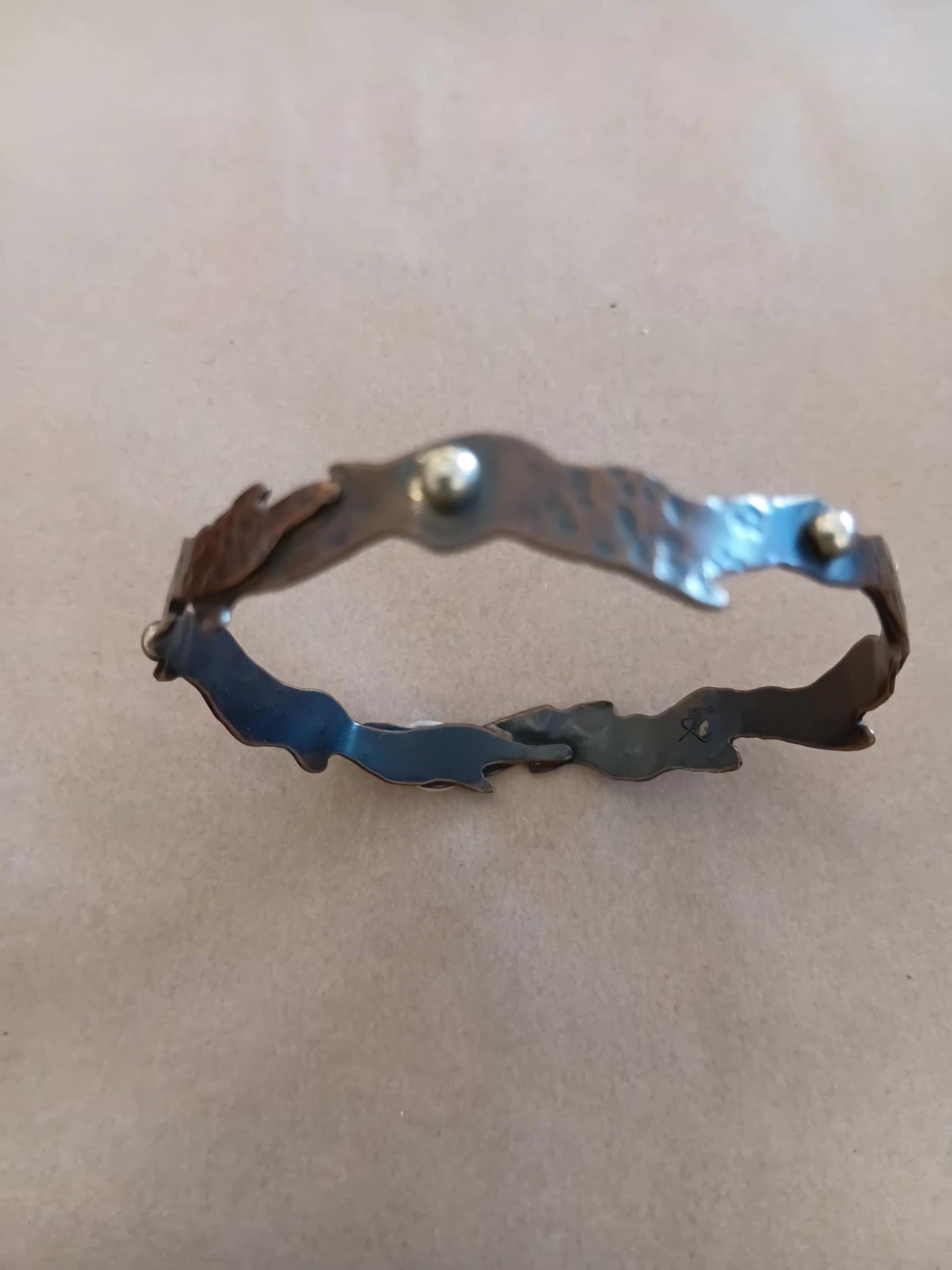 Copper cut out seaweed & silver pod bracelet