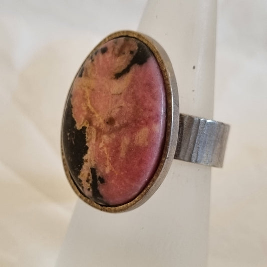 Oval pink (Rodanite) ring