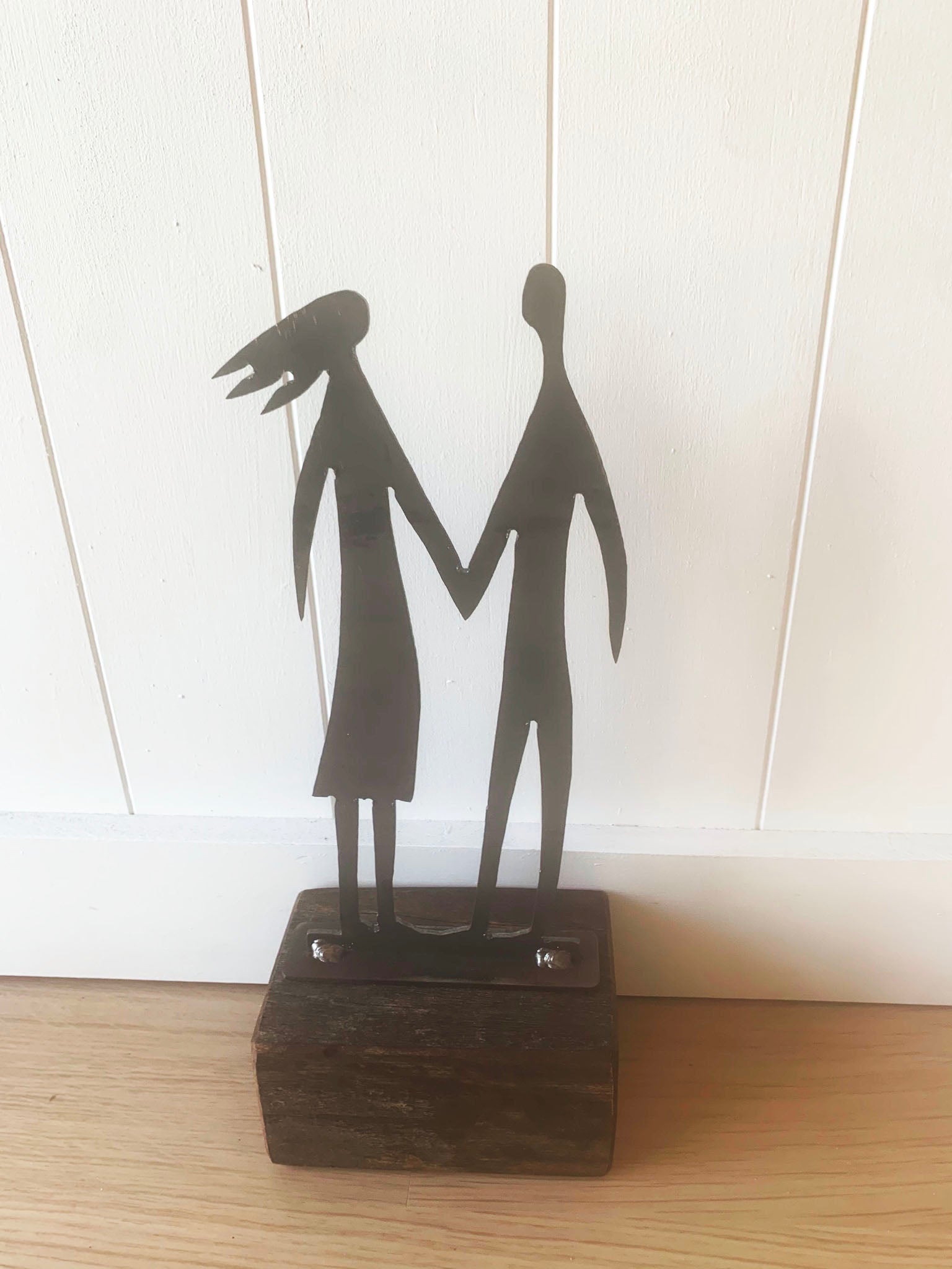 Steel Couple on wooden block